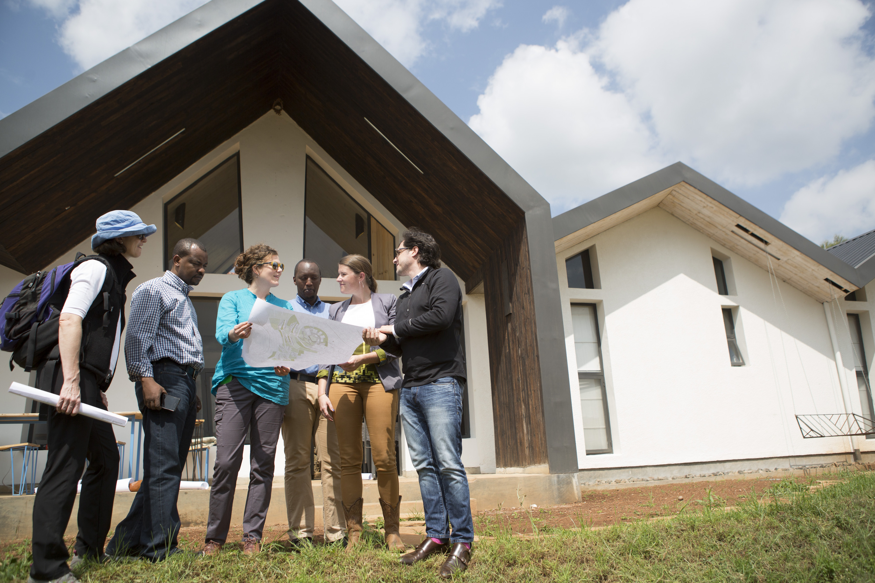 Dr. Peter Drobac and representatives of Bill & Melinda Gates Foundation, Inshuti Mu Buzima, and MASS Design Group.