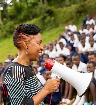 Dr Akiiki Speaking to Butaro high school students, launching Bwiza Initiative - a program to address period poverty
