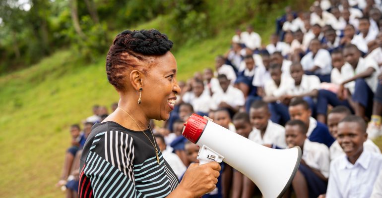 Dr Akiiki Speaking to Butaro high school students, launching Bwiza Initiative - a program to address period poverty